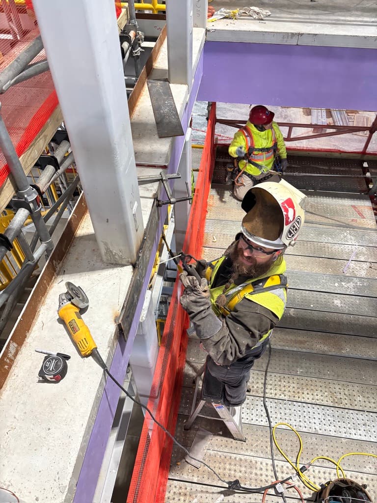 Antenna installation — interior scissor lift work
