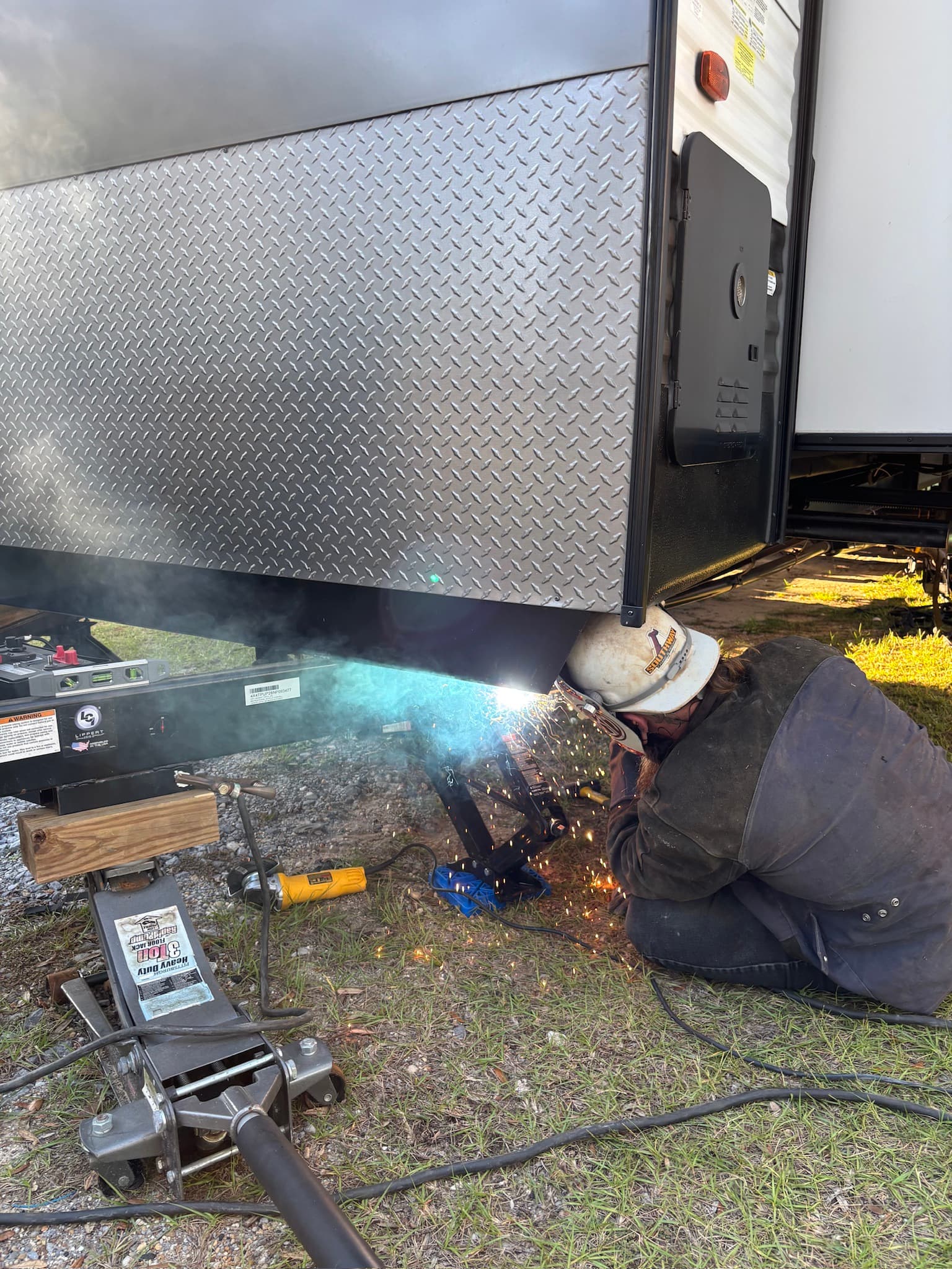 RV trailer jack repair with sparks